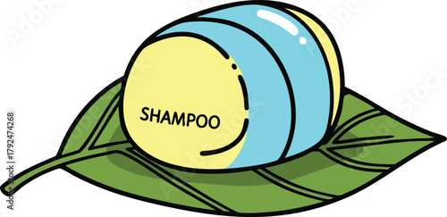 Yellow Shampoo Bar With Blue Wrapper On A Green Leaf