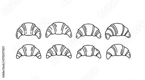 Eight hand drawn croissant pastry icons in a silhouette style