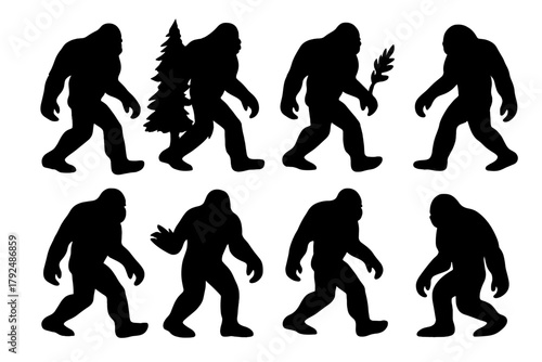 Eight mythical Bigfoot Sasquatch creature silhouettes walking and standing in various poses
