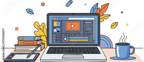 Creative workspace with laptop tablet books and coffee on a desk with autumn leaves and pastel background