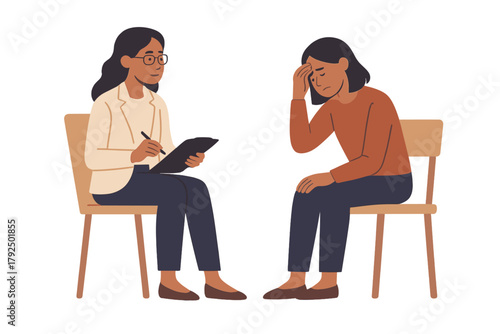 Mental health professional taking notes while consulting with a distressed patient