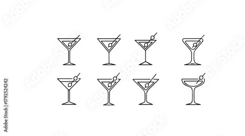 Collection of eight martini glasses with olives and straws silhouette