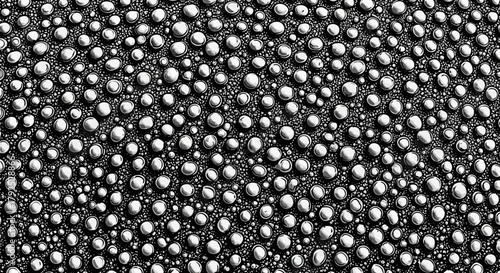 Monochrome abstract background of countless shiny metallic spheres.