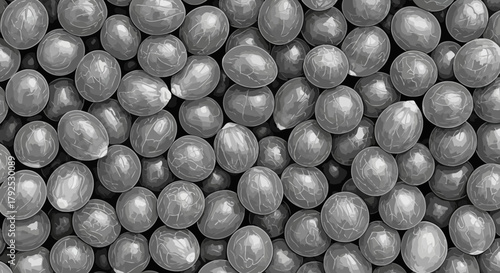 Close up of small metallic ball bearings used in industrial applications.