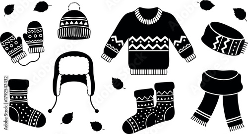 Winter clothing vector set with mittens hat sweater socks scarf and warm accessories in black silhouette style