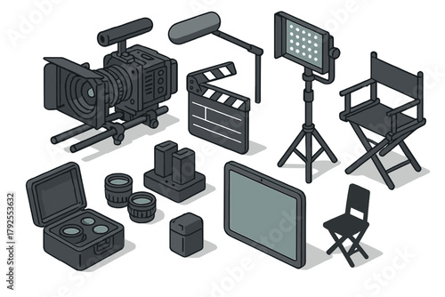 Professional film production equipment set including camera, clapperboard, lighting, and monitor