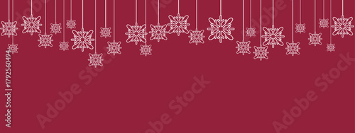 Festive holiday border/banner with white hanging snowflakes of varying sizes suspended by thin lines against a deep red background. Simple, elegant design suitable for Christmas, New Year