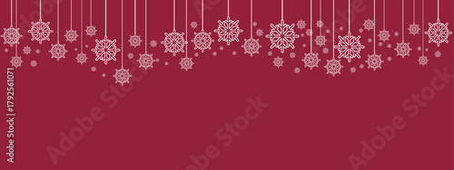 Festive holiday border/banner with white hanging snowflakes of varying sizes suspended by thin lines against a deep red background. Simple, elegant design suitable for Christmas, New Year