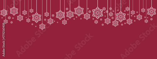 Festive holiday border/banner with white hanging snowflakes of varying sizes suspended by thin lines against a deep red background. Simple, elegant design suitable for Christmas, New Year