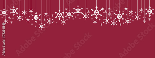 Festive holiday border/banner with white hanging snowflakes of varying sizes suspended by thin lines against a deep red background. Simple, elegant design suitable for Christmas, New Year