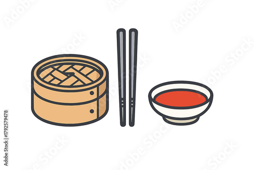Bamboo steamer basket, chopsticks, and dipping sauce in a ceramic bowl