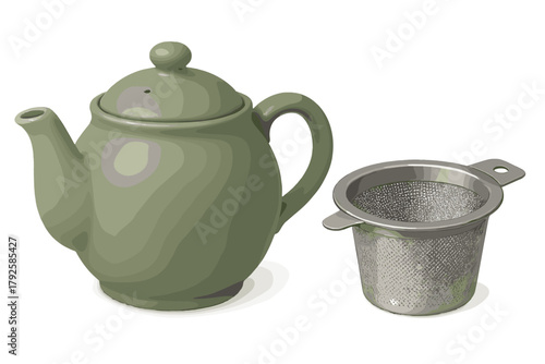 Matte sage green ceramic teapot and metallic tea infuser basket for brewing hot drinks