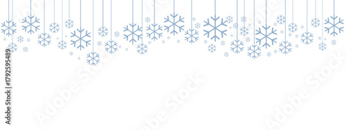 Winter holiday border or banner with pale blue hanging snowflakes of various sizes suspended by thin lines against a clean white background. Minimalist, cold-toned design suitable for winter.