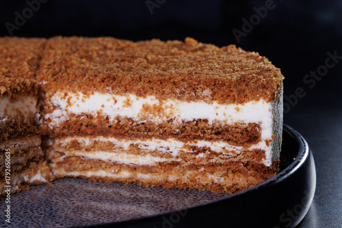 Wallpaper Mural Layered Crumb Cake With Cream Filling On Dark Plate Torontodigital.ca