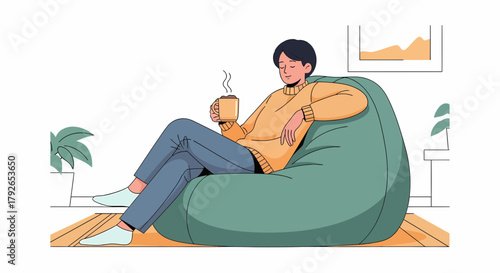 Relaxed Man Enjoying Coffee In Comfortable Beanbag Chair At Home