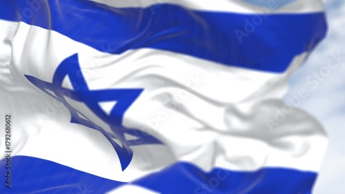Israeli flag with Star of David waving in wind on blue sky, 3D render