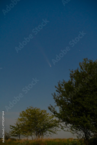 Stunning Astronomical Capture: Bright Comet C/2023 A3 (Tsuchinshan–ATLAS) Shines in the Deep Black Sky, Featuring Star Fields and the Comet's Tail