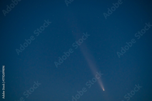 Stunning Astronomical Capture: Bright Comet C/2023 A3 (Tsuchinshan–ATLAS) Shines in the Deep Black Sky, Featuring Star Fields and the Comet's Tail