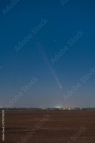 Stunning Astronomical Capture: Bright Comet C/2023 A3 (Tsuchinshan–ATLAS) Shines in the Deep Black Sky, Featuring Star Fields and the Comet's Tail