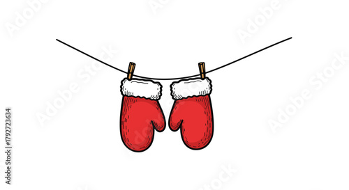 Two cozy red mittens with fluffy white trim hanging on a clothesline to dry.