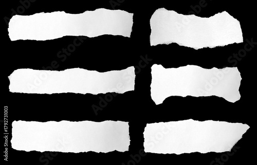 A collection of long torn white paper strips isolated on a black background, showing rough edges and organic shapes, ideal for collage design, creative layouts, digital art, posters, and elements.