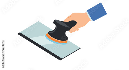 Hand holding a trowel for plastering and construction work