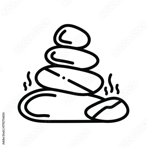 Stack of smooth hot stones for spa treatment