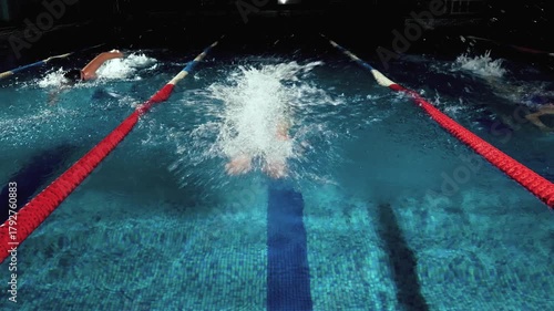 Cinematic Butterfly Swimmer Leading Freestyle Swimmers, 4K