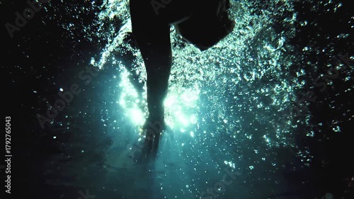 Cinematic Underwater Flip Turn by Professional Male Swimmer in Slow Motion