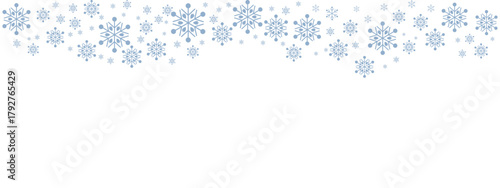 Winter snow border with pale blue snowflakes of varying sizes drifting down from the top edge against a clean white background. Minimalist, cold-toned design suitable for Christmas, New Year