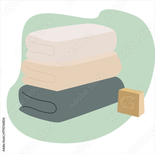 pile of towels and bars of soap