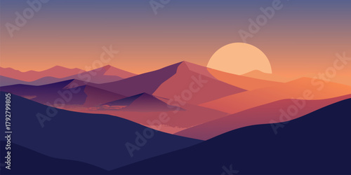 Mountain peaks at sunrise with a large sun landscape