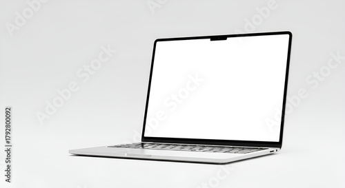 A laptop with a blank white screen is displayed on a white background in a studio setting style