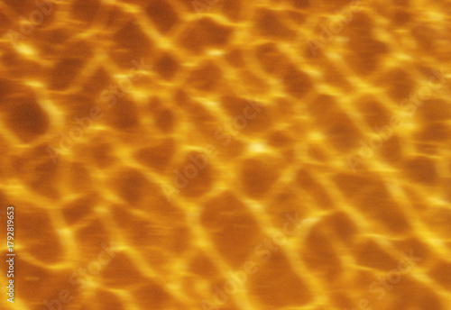 Close-up abstract texture of a molten amber surface with glowing ripple patterns and warm reflections, capturing radiant fluid light textures for backgrounds and digital art
