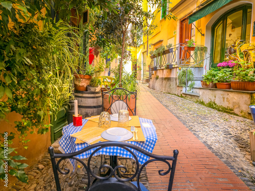Table in a street of the old town of Bordighera, Italy