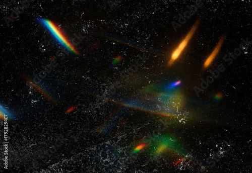 Tableau sur toile A vast outer space scene featuring multiple colorful light streaks and rainbow d