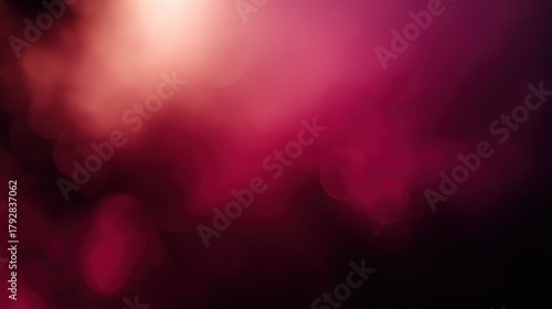 Abstract background with soft pink, red, and dark purple bokeh lights and a bright glow, a dreamy, blurred effect, blurred red background
