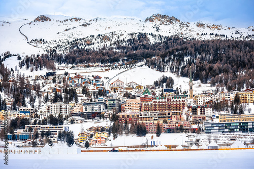 Town of Sankt Moritz luxury winter travel destination view from frozen lake