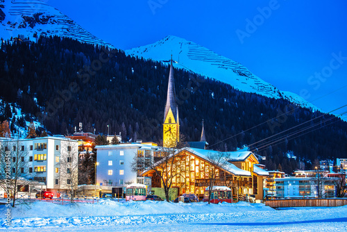 Idyllic mountain town of Davos in Swiss Alps evening view