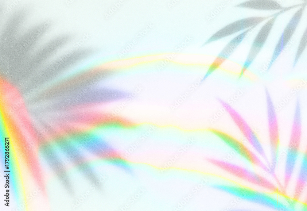 Fototapeta premium Dreamy tropical scene with softly blurred palm frond silhouette, pastel rainbow arcs, warm sunlit glow, and airy abstract background ideal for nature, travel, and summer visuals