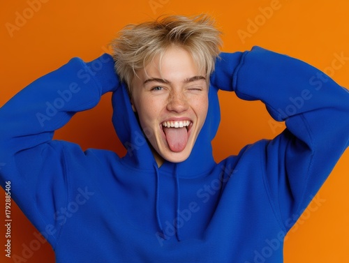 Smiling person with short b...