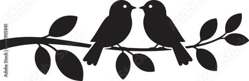 Two black bird silhouettes facing each other on a branch with leaves white