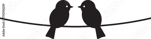 Two black silhouette birds facing each other perched on a thin black line black and white