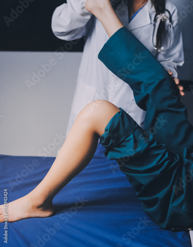 Rehabilitation therapy Professional male physiotherapists working in rehabilitation centers while treating male patients with leg and muscle pain.