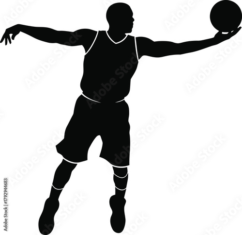 Silhouette of a basketball player jumping to shoot