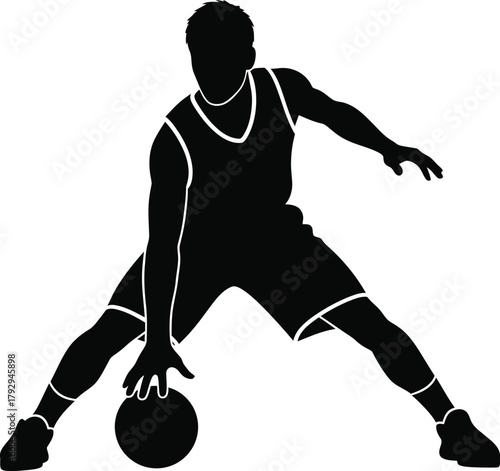 Silhouette of a basketball player dribbling the ball