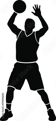 Silhouette of a basketball player shooting a ball