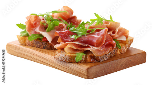 Delicious bruschetta with prosciutto and arugula isolated on transparent background