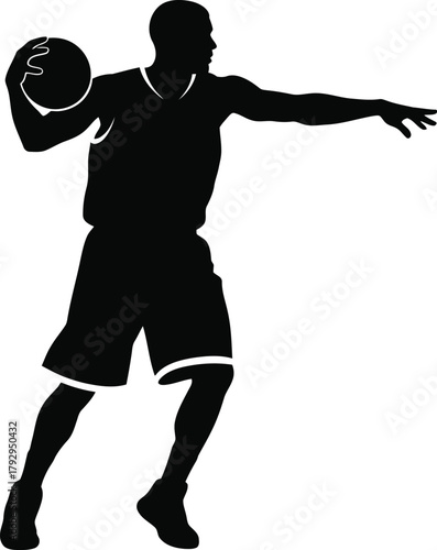 Silhouette of a basketball player in action