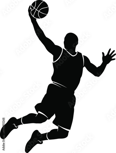 Silhouette of a basketball player mid air dunking the ball